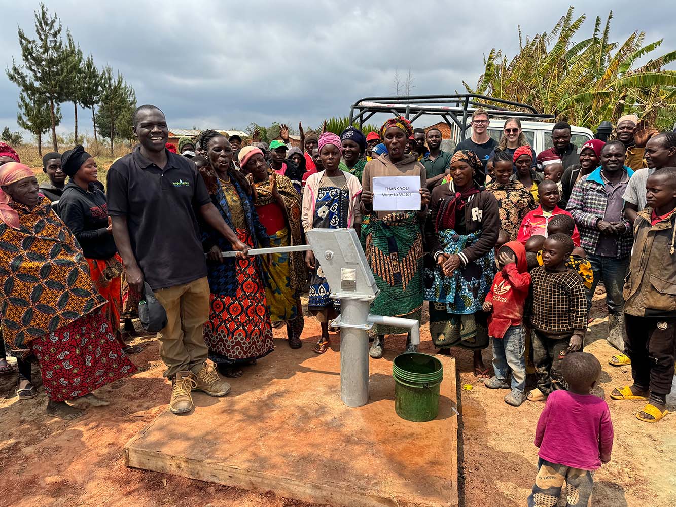 Community members collecting clean water.
